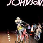 Betsey Johnson, always a character, rides into her spring 2011 show finale in September.
