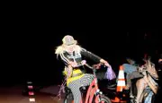 Betsey Johnson, always a character, rides into her spring 2011 show finale in September. Betsey Johnson, always a character, rides into her spring 2011 show finale in September.