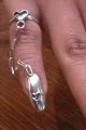 http://www.etsy.com/listing/41732745/slave-nail-ring?ref=sr_gallery_9&ga_search_query=chain+nail+&ga_search_type=all&ga_facet=