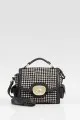 http://www.shefinds.com/2011/houndstooth-the-hottest-trend-for-fall-just-ask-lady-gaga