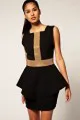 http://www.shefinds.com/2011/this-photo-says-it-all-the-black-peplum-is-the-dress-of-the-season-right-gaga/
