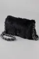 3. Fur Tory Burch handbag