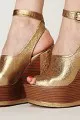 Free People Camryn gold wedges