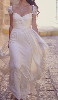 via Pre-Owned Wedding Dresses 