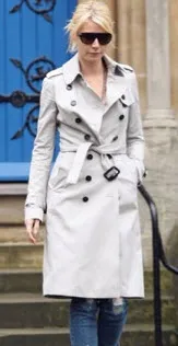 gwyneth paltrow in a light khaki trench coat and sunglasses