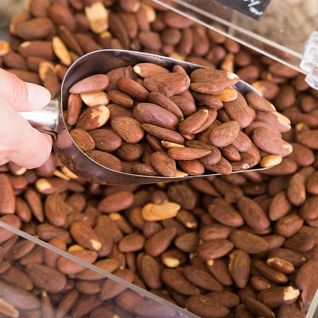 <h2>3. Almonds</h2> almonds best healthy foods shrink waistline
