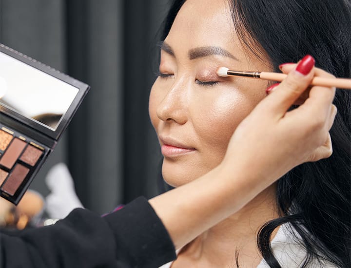 makeup-artist-applying-eyeshadow-model
