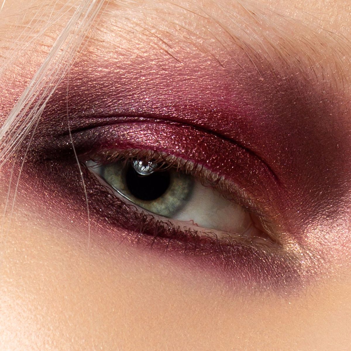 close up red sparkly eyeshadow model smokey