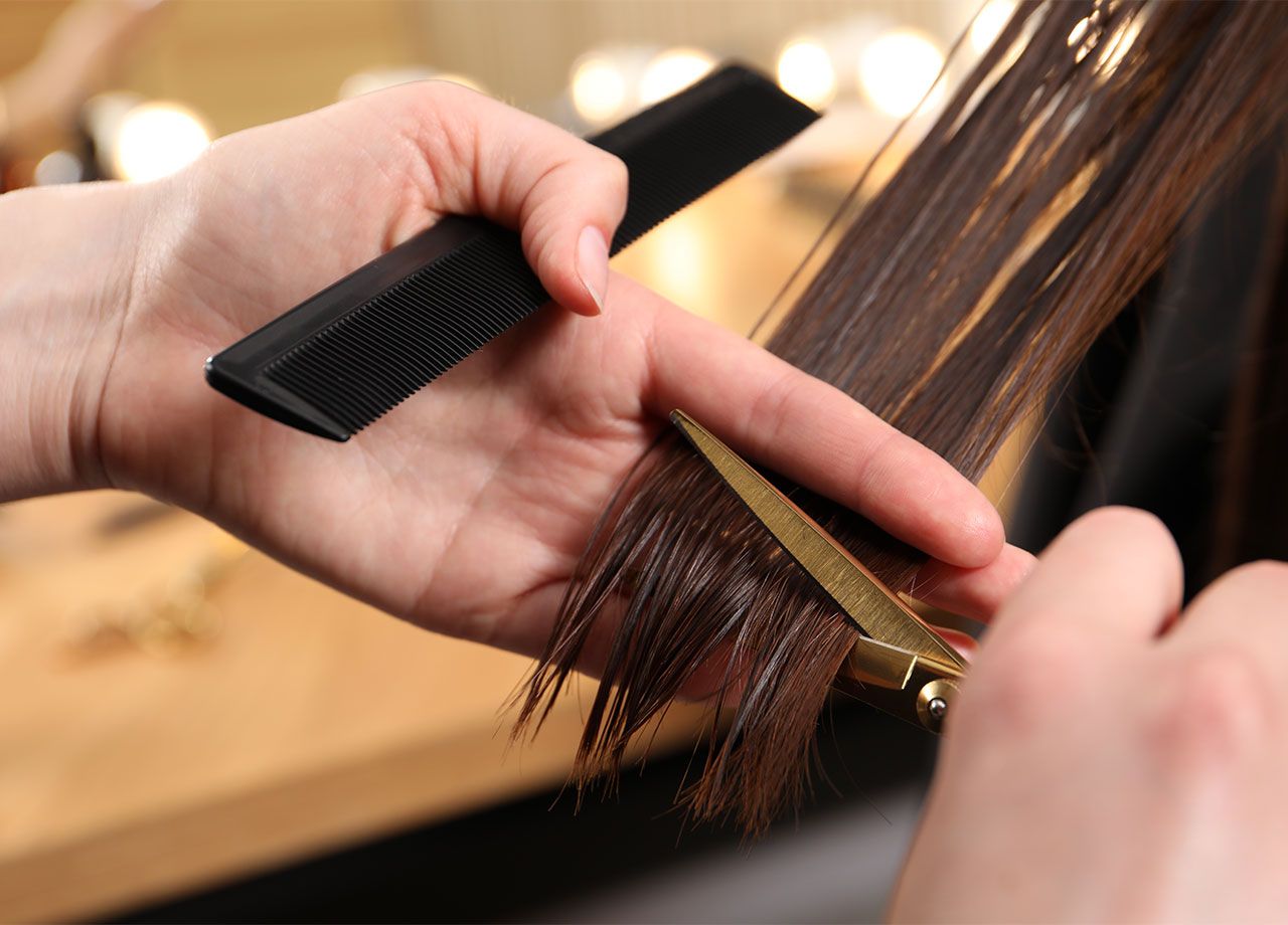 hair-stylist-trimming-hair