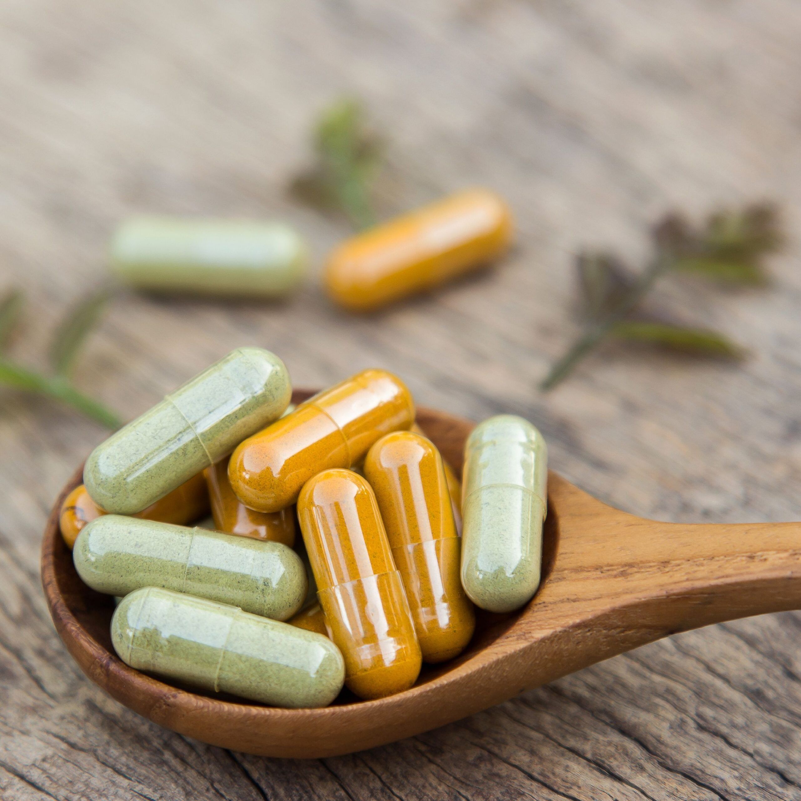 herbal supplements in spoon
