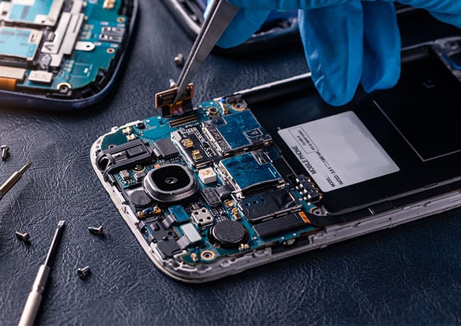 technician-fixing-smartphone