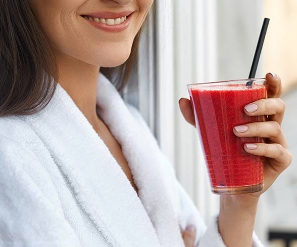 Bloody Mary Mixes Could Pack On Calories And Sodium woman with drink