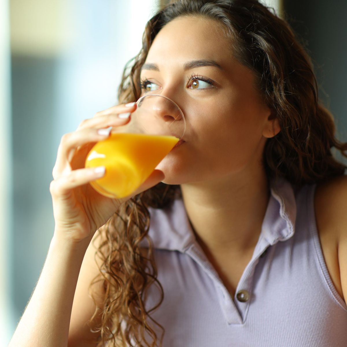 woman drinking juice
