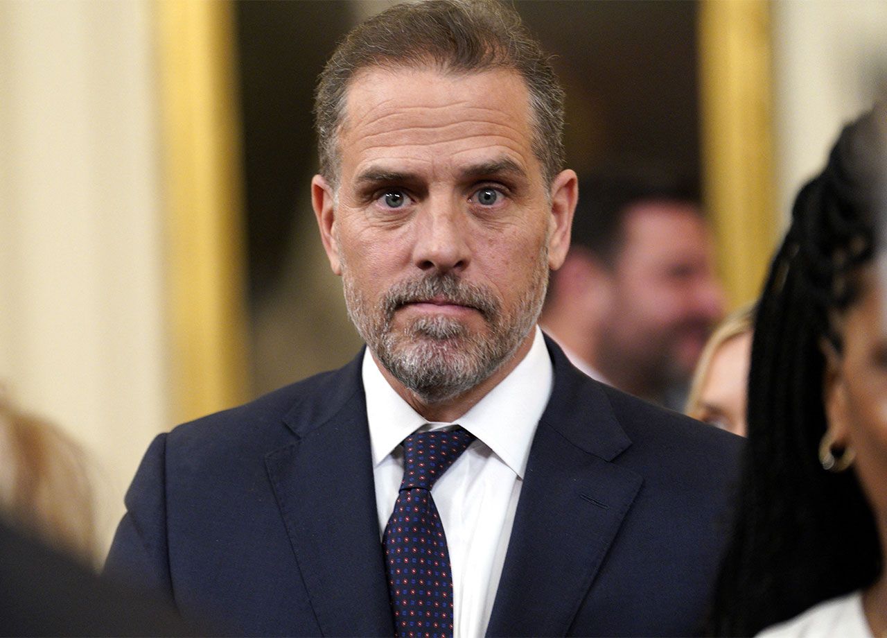 Hunter Biden navy blue suit in east room at the white house