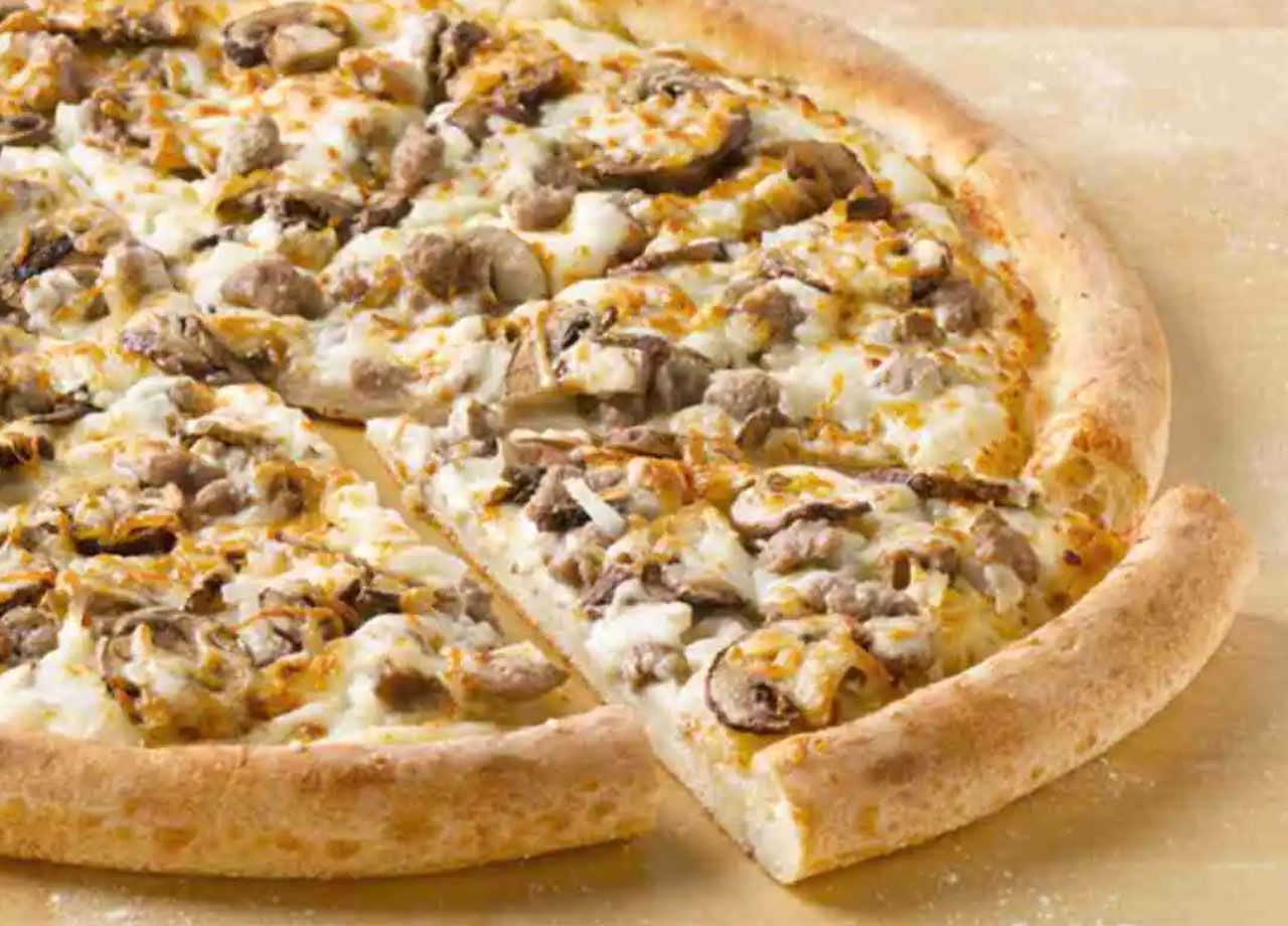 Mushrooms on swiss burger pizza at papa johns