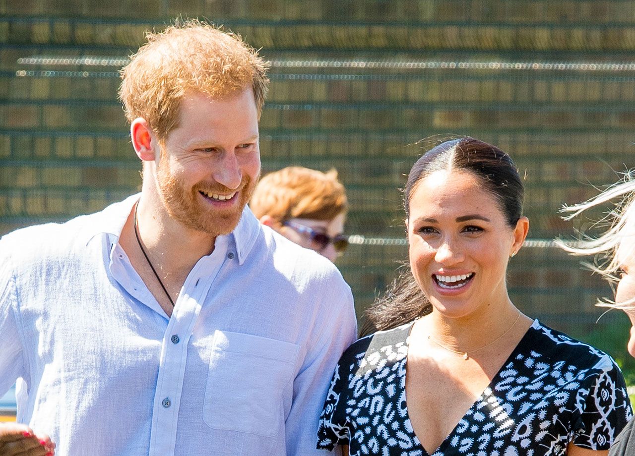 Prince Harry and Meghan Markle smiling together