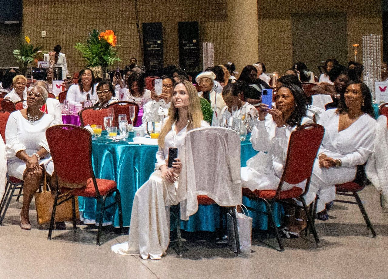 Angelina Jolie watches daughter Zahara give a speech at Women in Training Inc.'s Annual Mother-Daughter Brunch