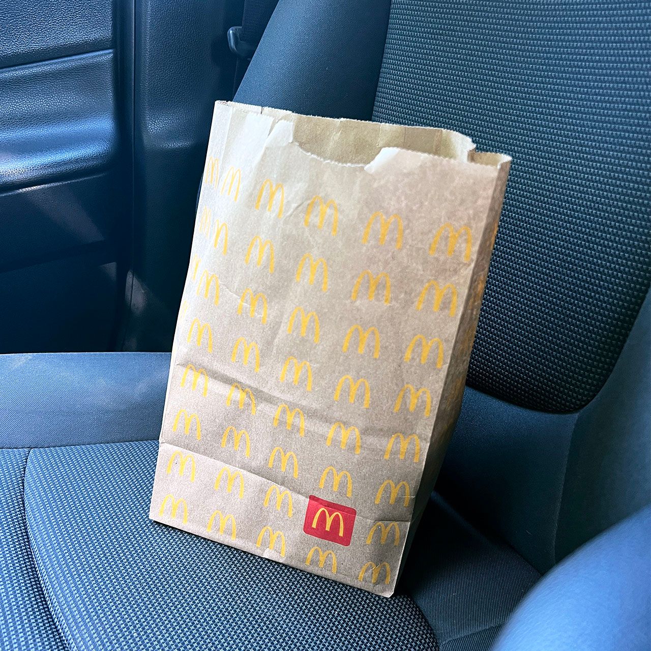 mcdonalds bag in car
