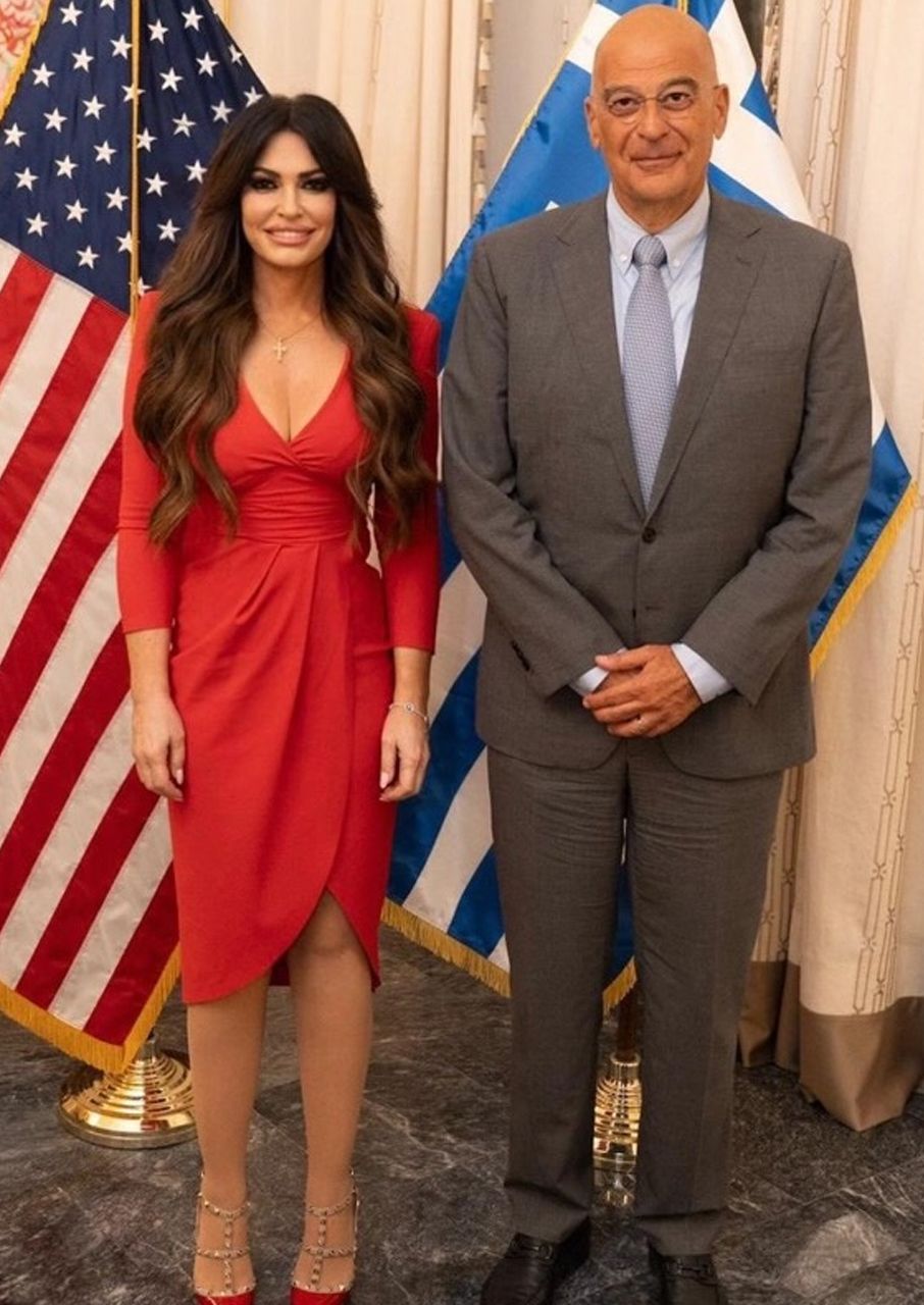 Kimberly Guilfoyle red dress Minister of National Defense