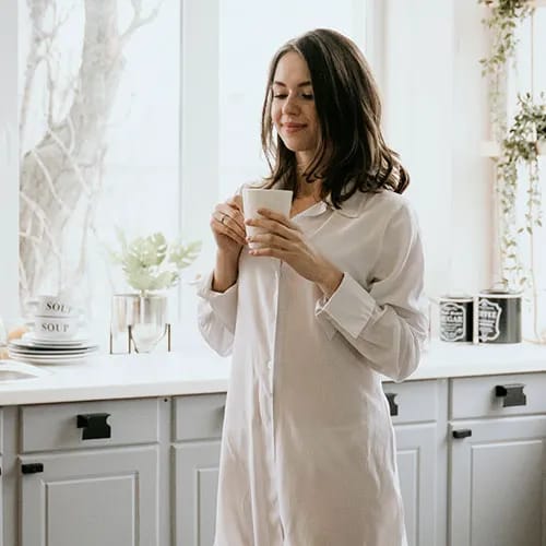 woman holding a mug