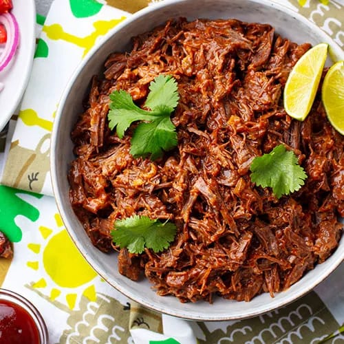 Honey Sriracha chicken in a Crock-Pot for tasty meals.