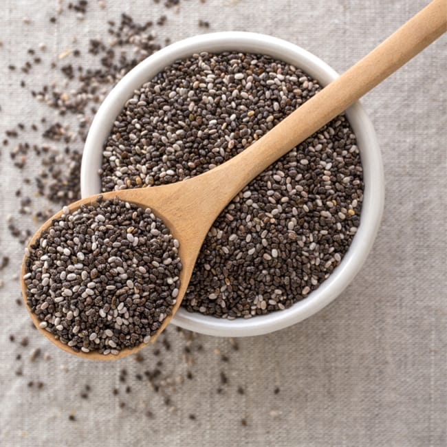 chia seeds and spoon in bowl