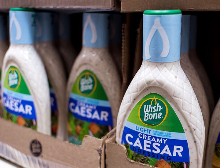 Bottle of Caesar salad dressing in a store