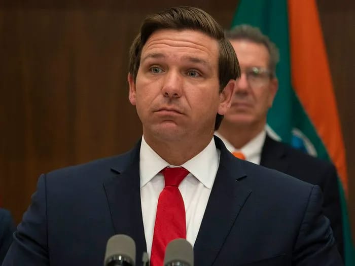 ron desantis speaking red tie
