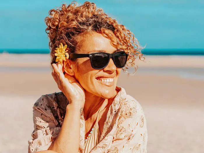 woman-enjoying-beach