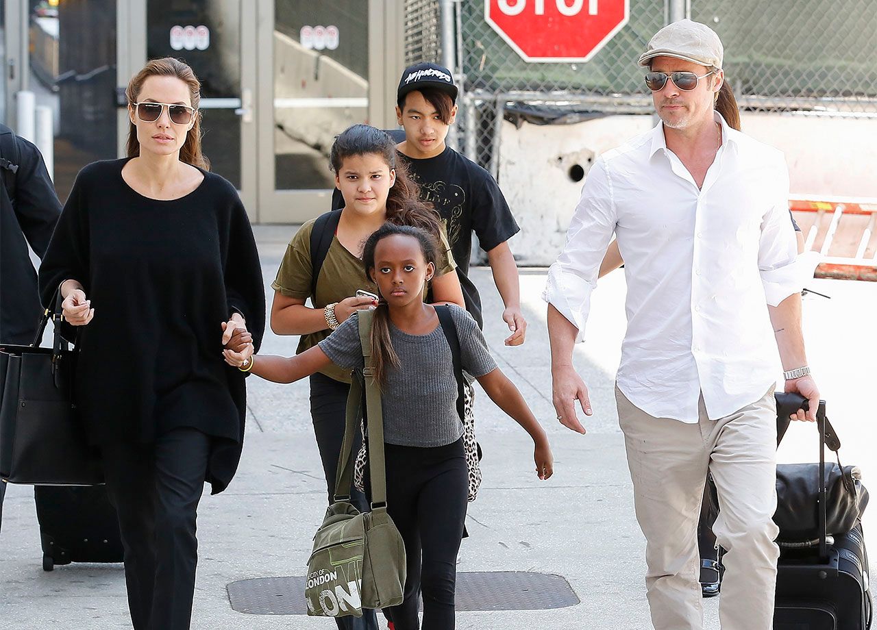 Angelina Jolie Brad Pitt walking with kids