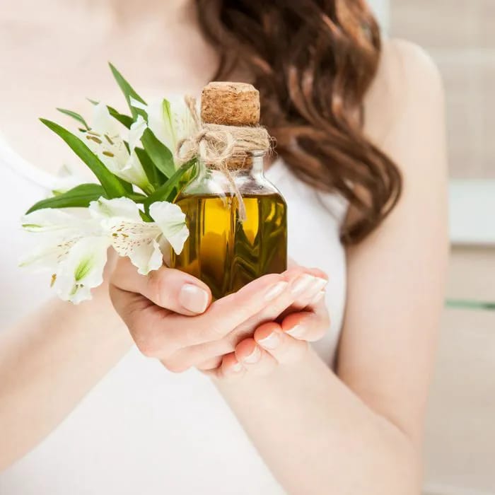 olive oil in bottle skincare dark hair hands shower