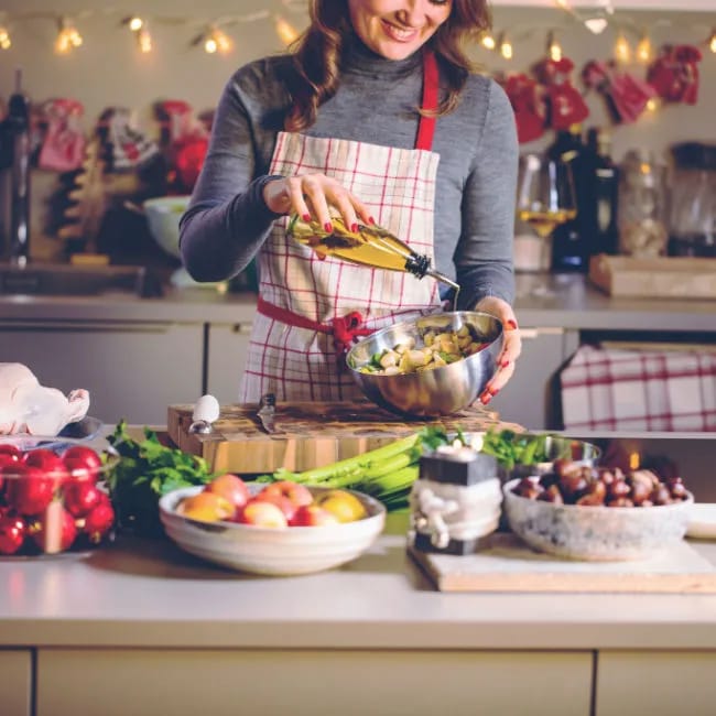 woman cooking thanksgiving dinner