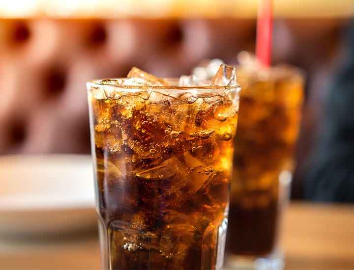 Glasses of soda on a table