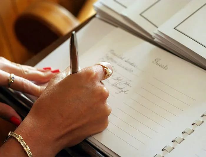 Traditional Guest Books Guest writing in guest book
