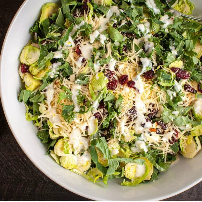 bowl of salad with creamy dressing