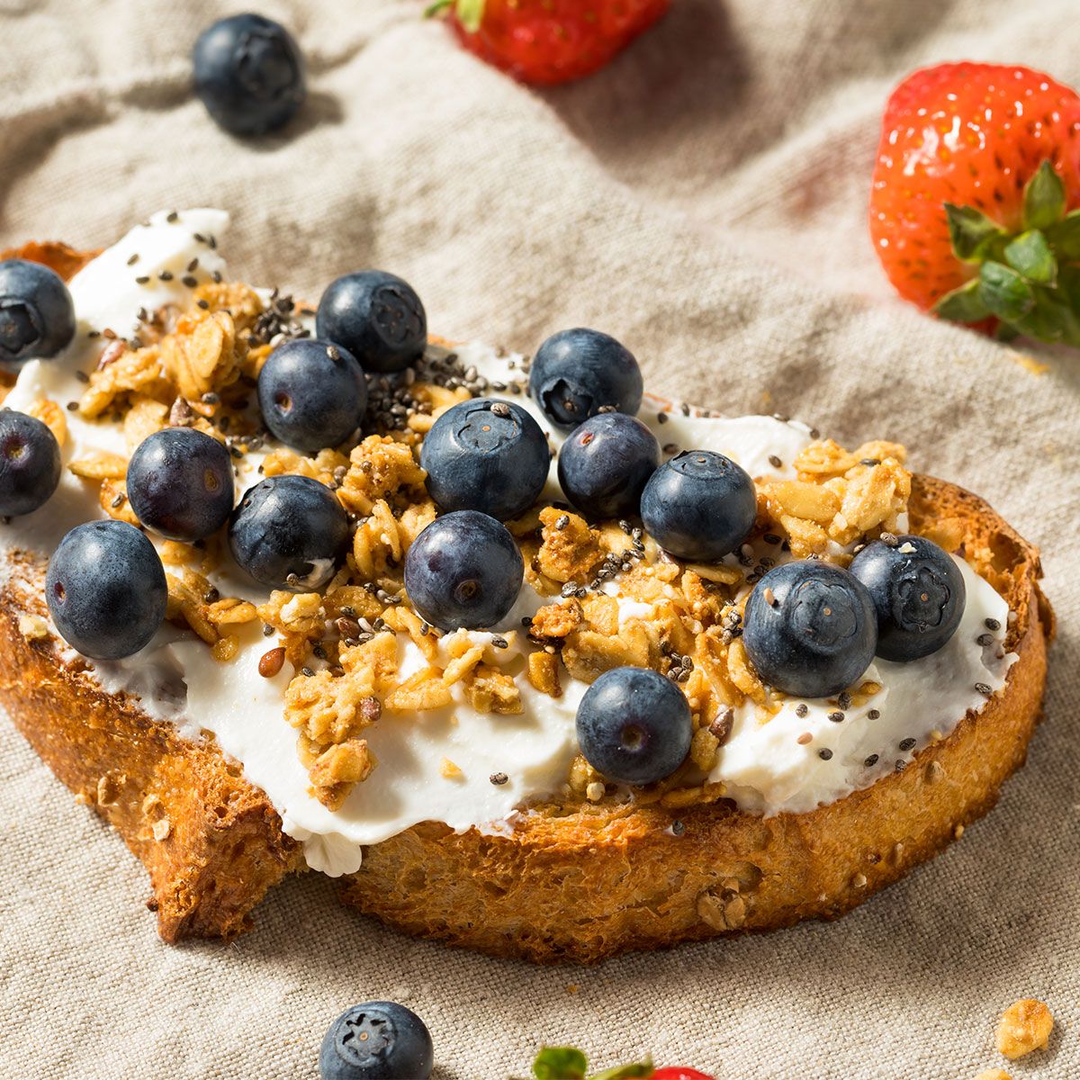 blueberries on toast with spread