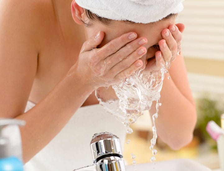 woman-washing-face