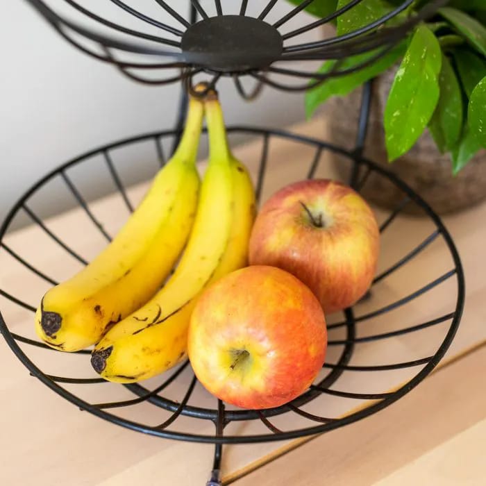 apples and bananas in fruit basket