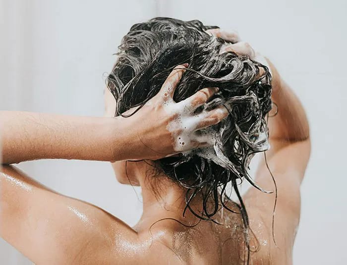 woman-shampooing-hair