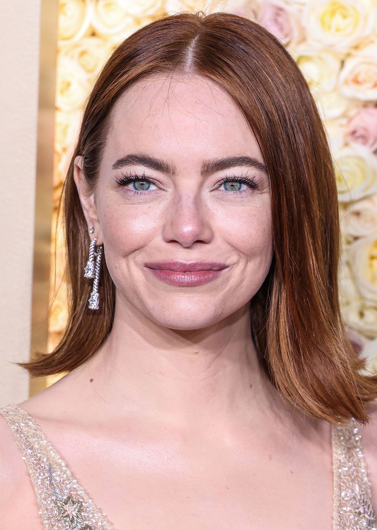 Emma Stone Shimmers In A Custom Louis Vuitton Dress With A Daring Center  Slit As She Takes Home The Golden Globe Award For Best Actress - SHEfinds