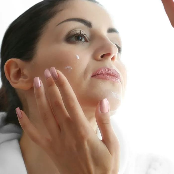 woman-applying-skincare
