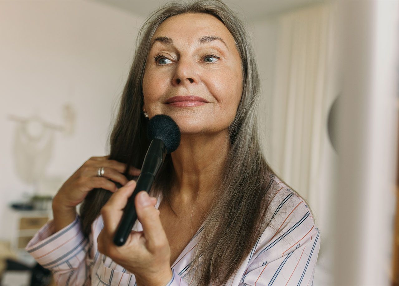 mature-woman-doing-makeup