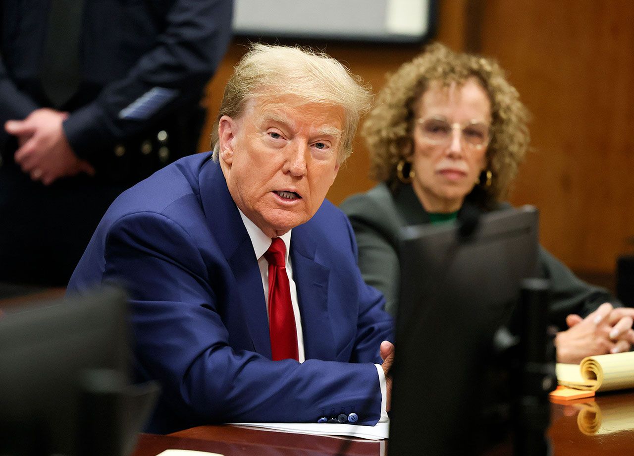 Donald Trump sits with lawyer Susan Necheles in court March 25 2024