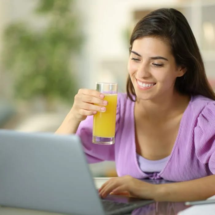 woman drinking juice