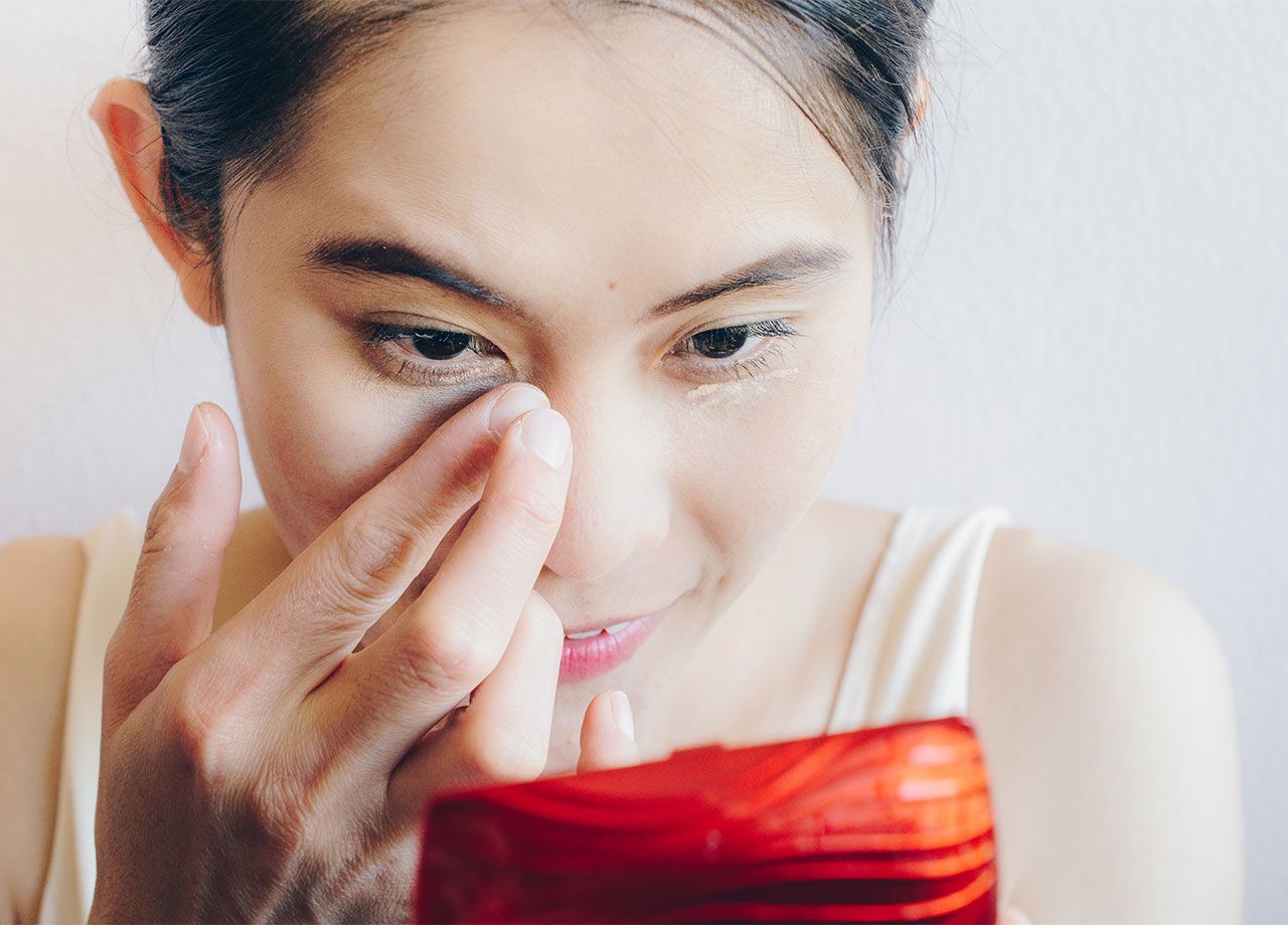 woman-concealing-dark-circles