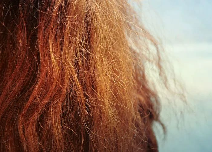 orange copper hair with frizz