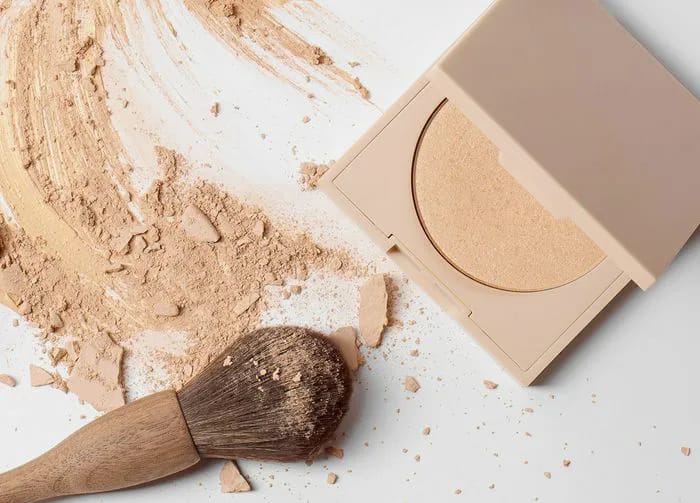powder foundation compact with brush