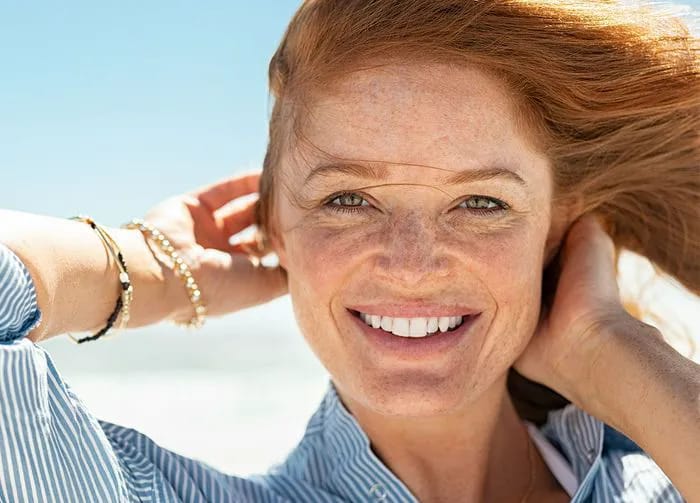 redhead-on-beach