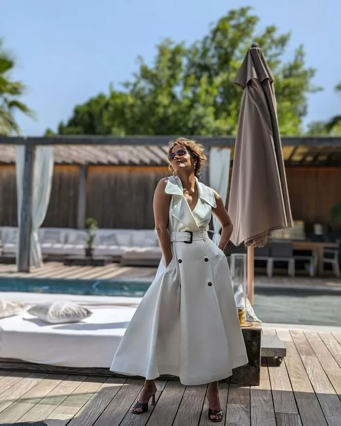 Halle Berry white halter dress by the pool Instagram