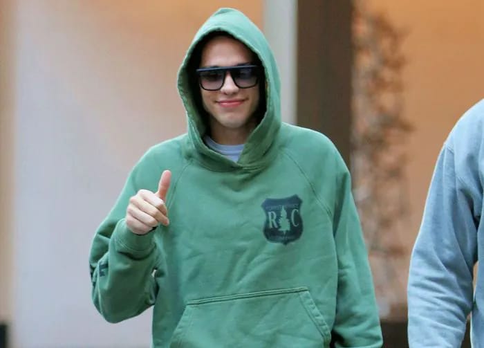 Pete Davidson peace sign thumbs up Bupkis set
